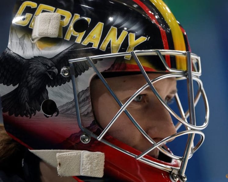 Ice hockey-Goalies show pride and personality with artistic helmets