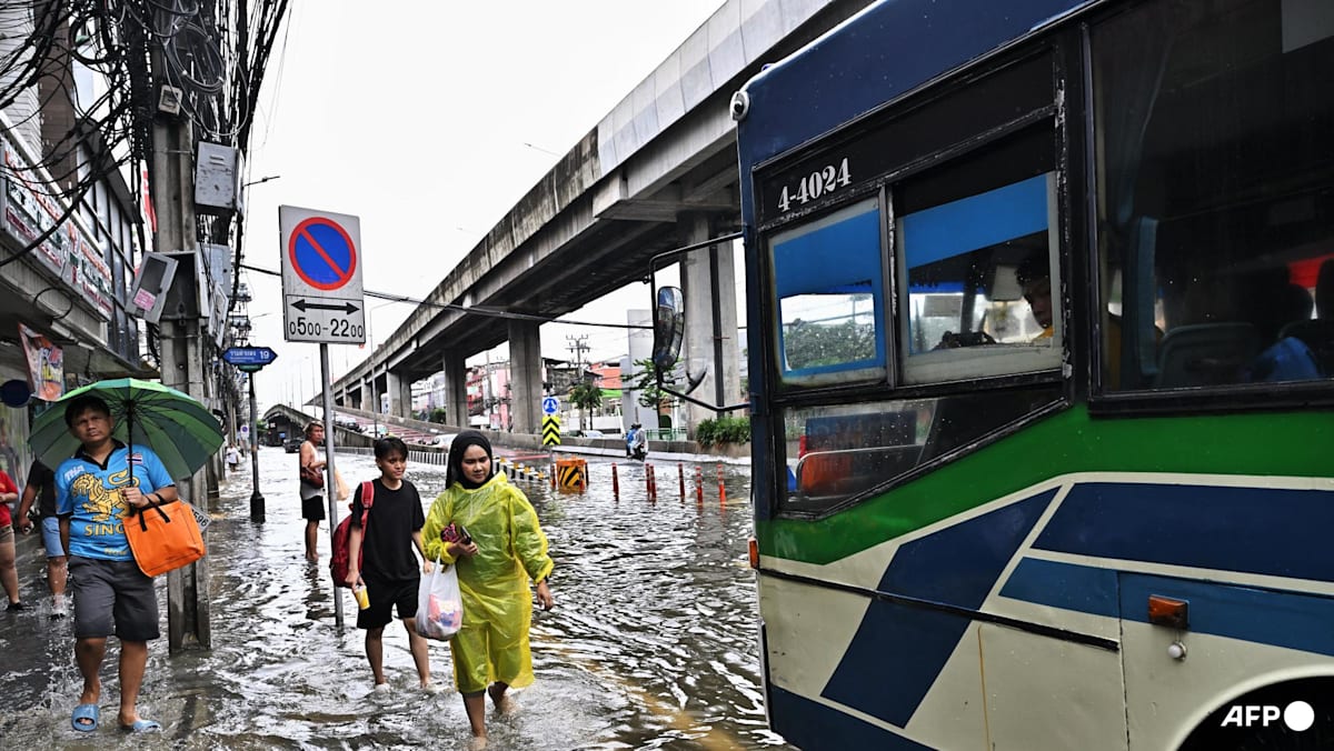 Bangkok Floods Evacuate Thousands into Emergency Shelters