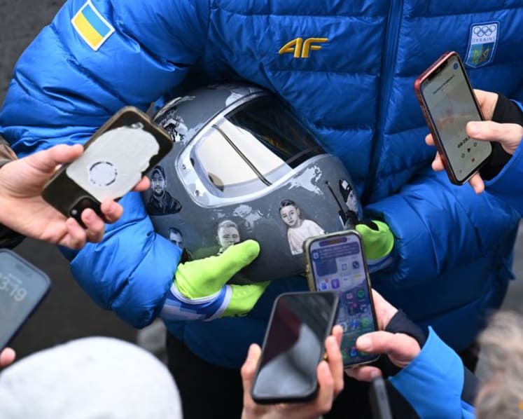IOC 'begs' defiant Ukrainian to race without war dead helmet
