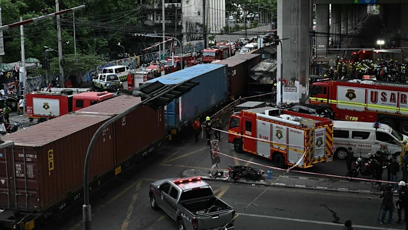 Train driver charged after deadly Bangkok bus collision