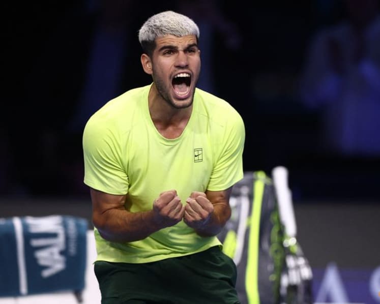 Alcaraz clinches year-end top spot with ATP Finals win over Musetti
