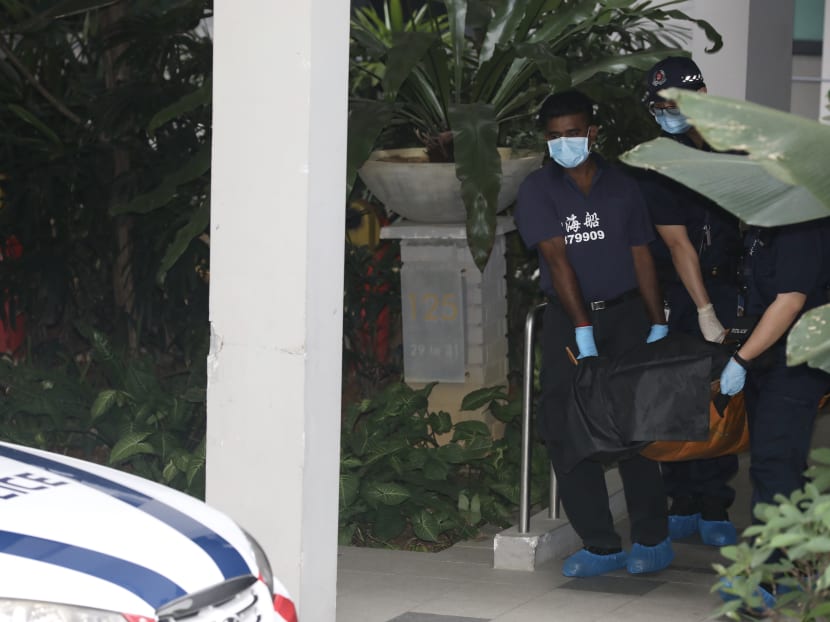 The police are seen carrying the body of the deceased out of the building.