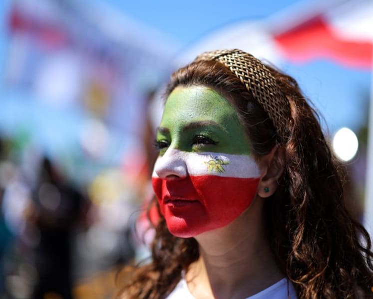 Iranian American protesters gather as soccer team prepare for World Cup opener