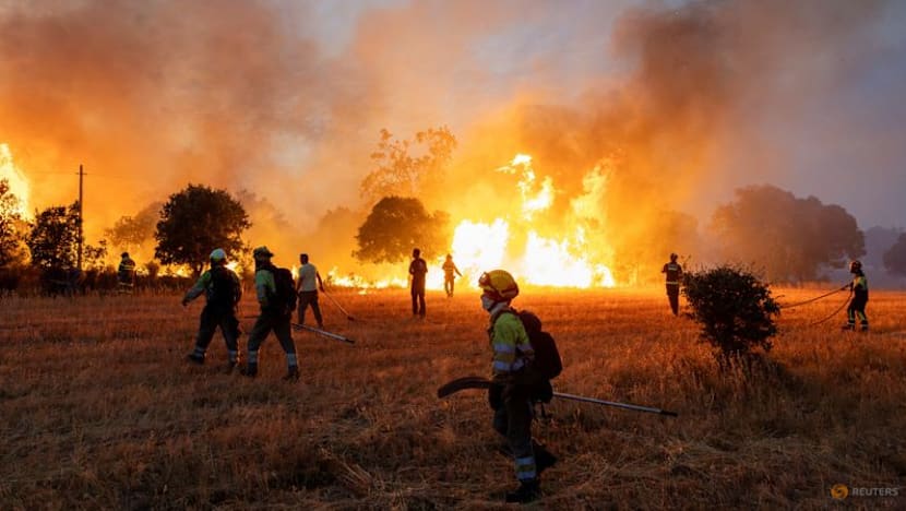 France firefighters hopeful, as Spain ends national emergency