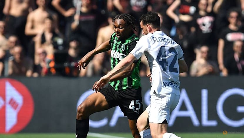 Milan held to 2-2 home draw by Sassuolo after late Lauriente equaliser