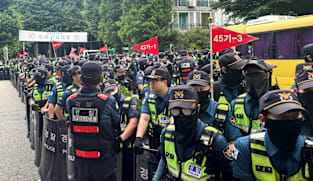 South Korean riot police clear protesters after ballot shortage blockade