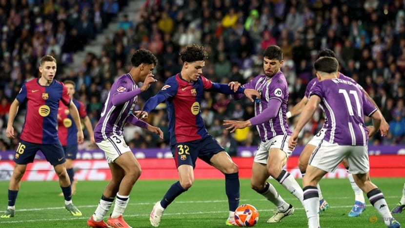 Barca keep title bid on track with 2-1 comeback win at Valladolid