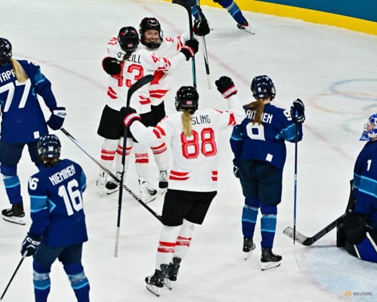 Ice hockey-Canada cruise to shutout win over Finland to seal women's group runners-up spot