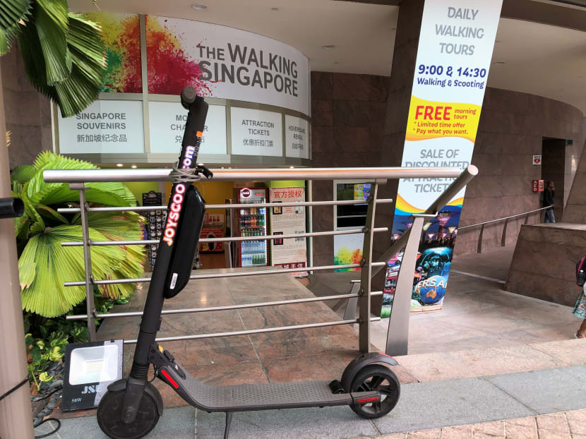 An electric scooter from JoyScoot lays idle at the Esplanade.