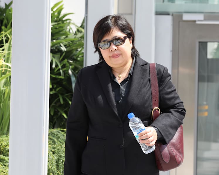 Woman seen in viral video not wearing face mask at MBS turns up at court without mask on