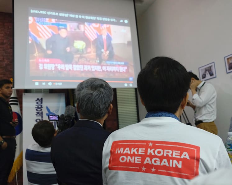 Emotional moment for South Koreans witnessing Trump-Kim meet, but doubts linger on