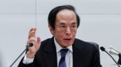 BOJ decides to slow bond taper, keeps rates steady