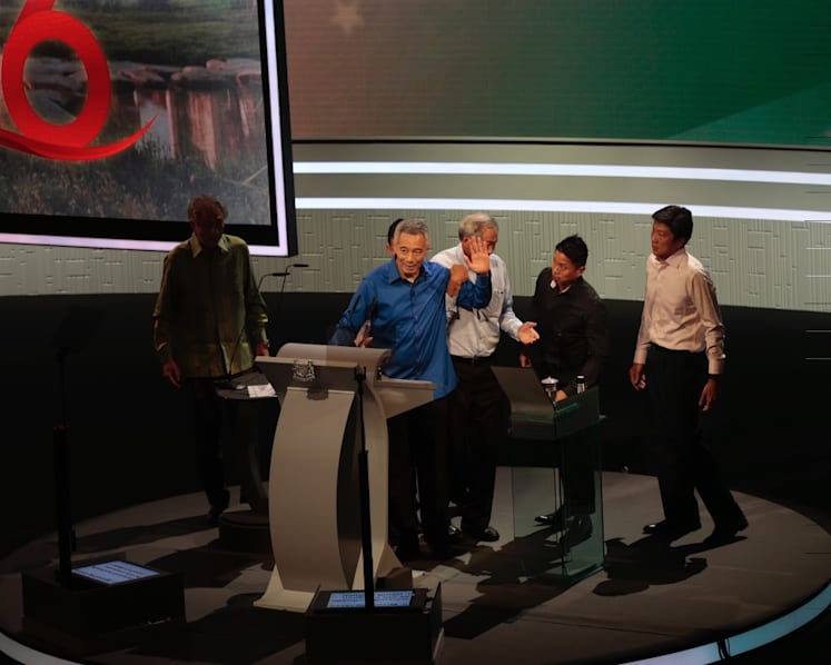 After ‘brief fainting spell’, a standing ovation as PM returns