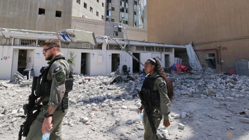Israel says Iran fired cluster bomb-bearing missile Israel says Iran fired cluster bomb-bearing missile