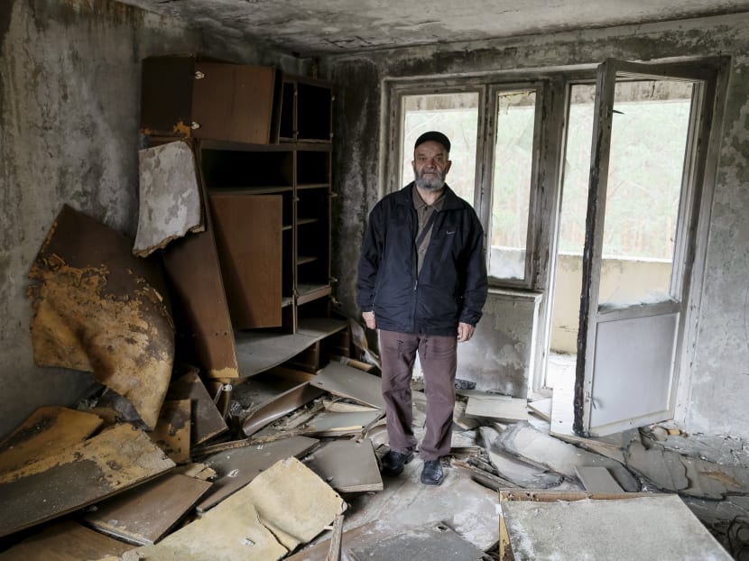 Gallery: Former Chernobyl residents take a bittersweet visit home