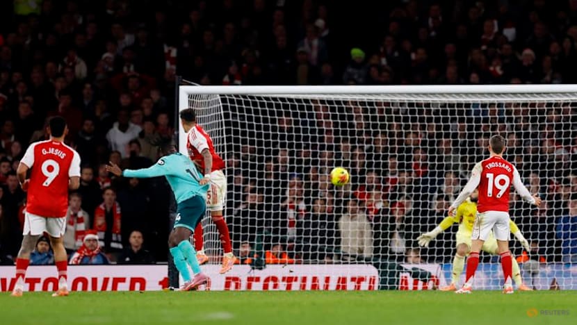 Arsenal get lucky break to go five points clear, Salah returns for Liverpool