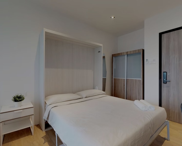 Company offering service apartments charged with providing illegal short stays in Singapore
