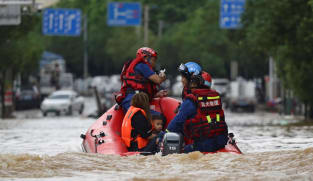 China warns of extensive flooding after heavy rains
