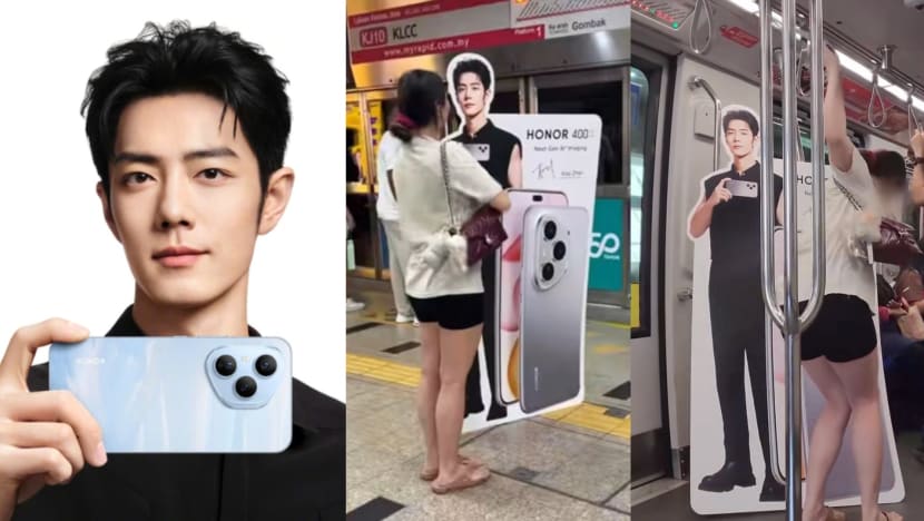 M'sian Woman Takes Train With Xiao Zhan Standee, Smacks Man Who Bumped Into It M'sian Woman Takes Train With Xiao Zhan Standee, Smacks Man Who Bumped Into It