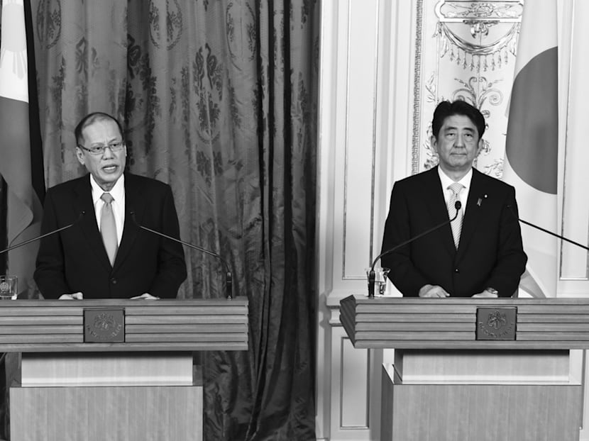 Abe stands up to China and Russia