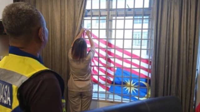 马国牙科诊所倒挂国旗遭停业30天 引发争议
