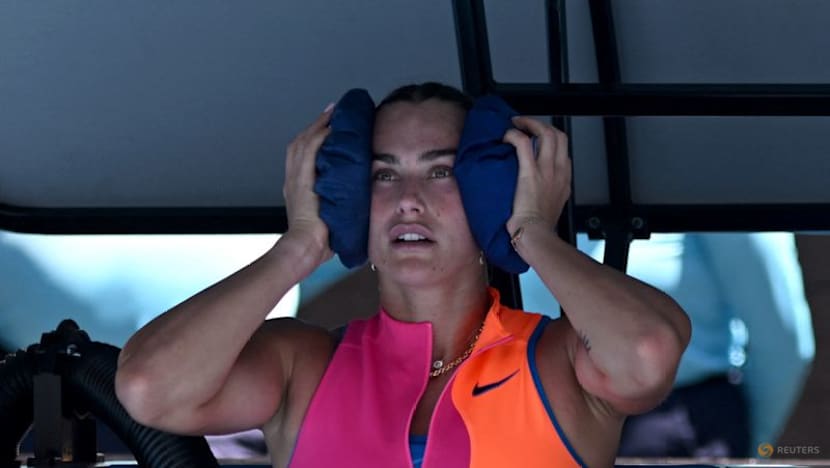 Organisers invoke extreme heat policy on hottest day at Australian Open