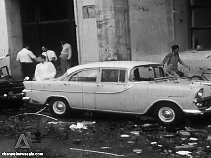 The two men who carried out the MacDonald House bombing (left) only revealed they were Indonesian marines during their trial, in the hope of being treated as prisoners of war under the Geneva Conventions. 
PHOTO: CHANNEL NEWSASIA