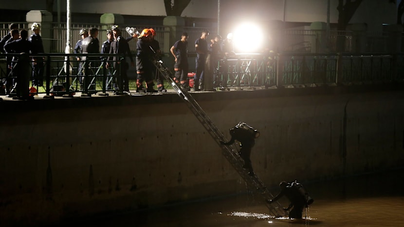 2 women killed after car plunges into Singapore River