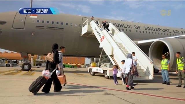 空军人员：撤离中东途中曾遇发射体 国人安全回国振奋人心