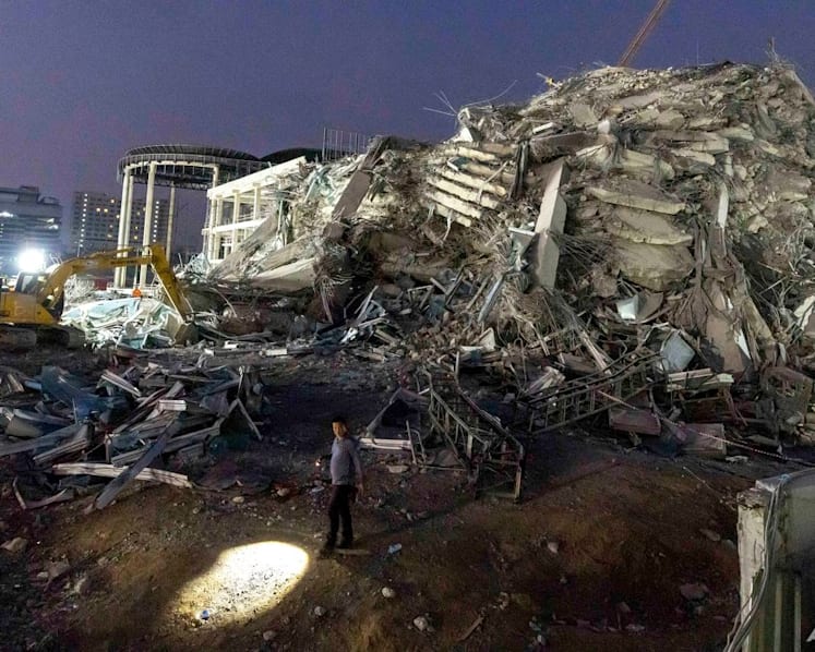 Thai construction magnate surrenders on felony negligence charges over building collapse in quake