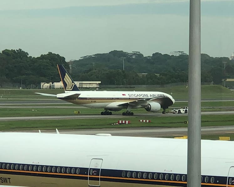 Tow tug catches fire while towing SIA plane at Changi Airport