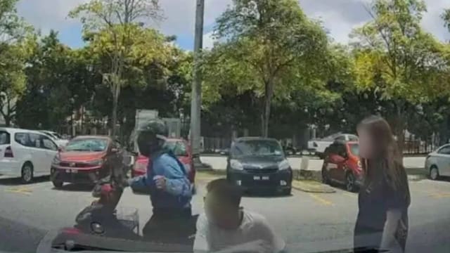 假撞车真抢劫 马国商人被夺走项链