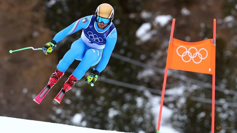 Alpine skiing-Italian trio set pace in sun-kissed downhill training