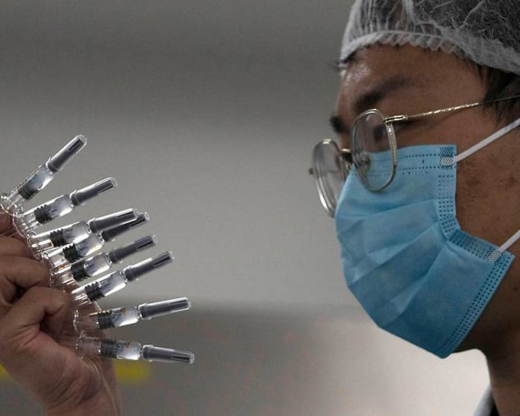 China rapidly expands use of experimental COVID-19 vaccines
