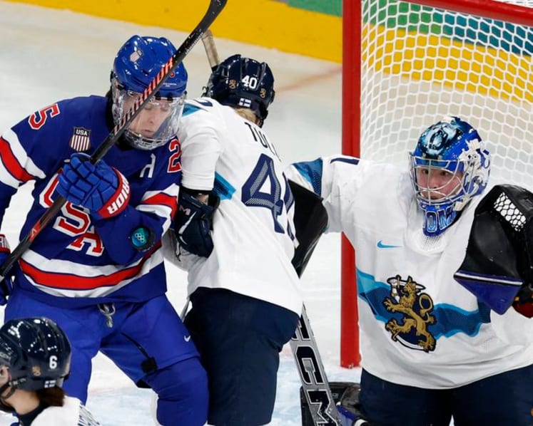 Ice hockey-Canada make winning start, US women thump Finns, Germany and Sweden triumph