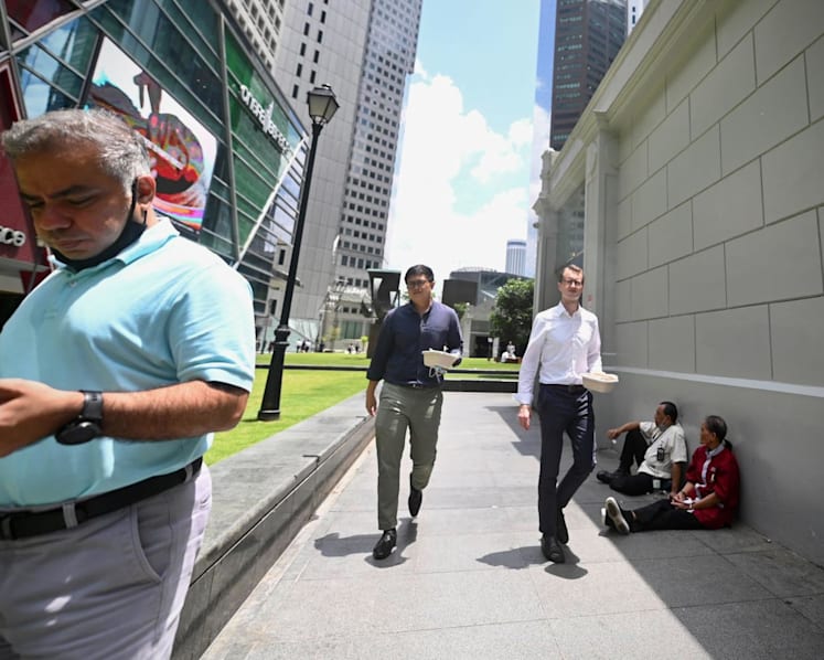 Some workers say they will not take masks off in office despite easing of COVID-19 measures