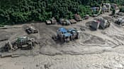 As it happened: Hundreds missing after avalanche triggers deadly flash floods at Nepal-Tibet border