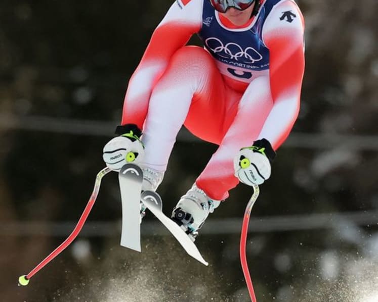 Alpine skiing-Von Allmen strikes gold again with more than a little help from his friend