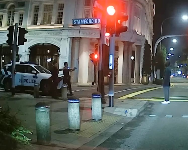 Police arrest man, 25, seen in video wielding axe on Stamford Road; 71-year-old man taken to hospital
