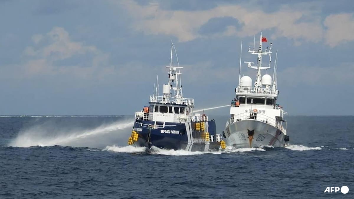 China, Philippines trade blame over boat collision in disputed sea