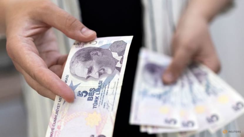 EM stocks, FX fall on renewed Iran war risks, but set for monthly gains