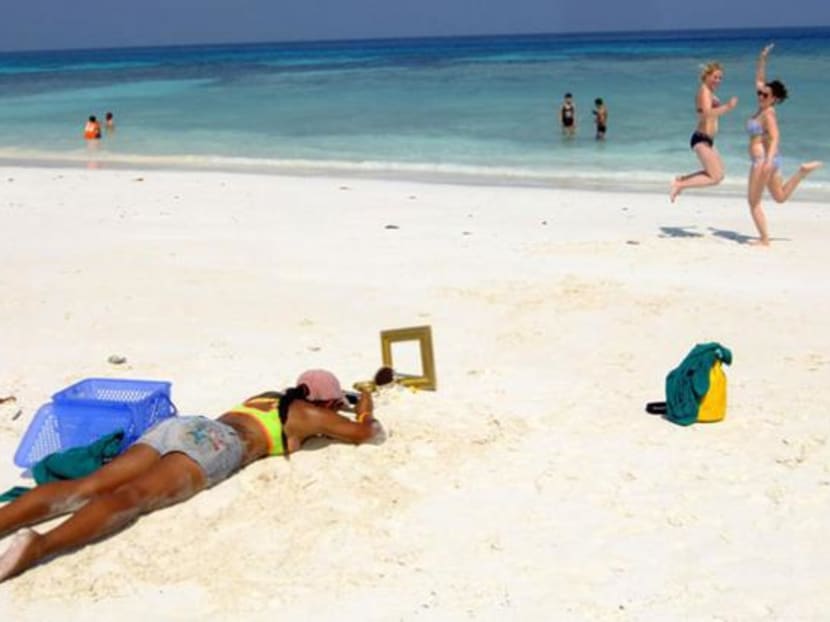 Tourists take photos on Koh Tachai in January 2015. Photo: Bangkok Post