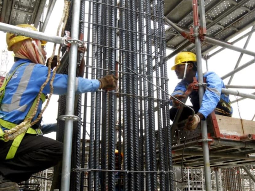 Workers at a construction site in Singapore on April 17, 2020.