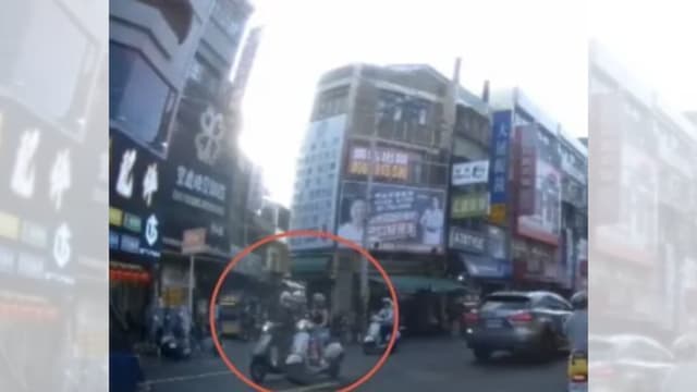 疑按喇叭引不满 台湾女骑士遭逼车殴打
