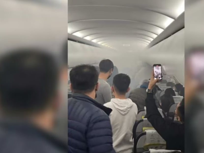 Smoke fills the cabin after a portable power bank reportedly caught fire on a Scoot flight bound for Singapore at Taiwan Taoyuan International Airport in Taipei on Jan 10, 2023.

