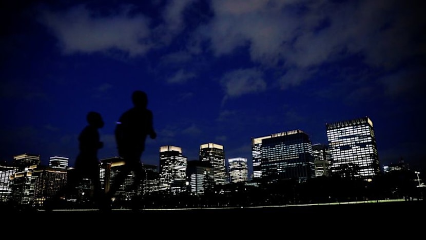 Japan says companies can rebuff unsolicited bids amid takeover risk concerns