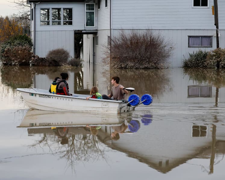 Immediate evacuations ordered for 3 Seattle suburbs after a levee failed from a week of heavy rain