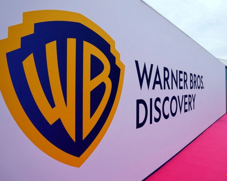 Exclusive-Comcast hires bankers to explore bid for Warner Bros Discovery