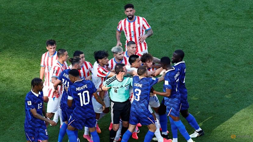 Mbappe keeps cool as France survive furnace against Paraguay
