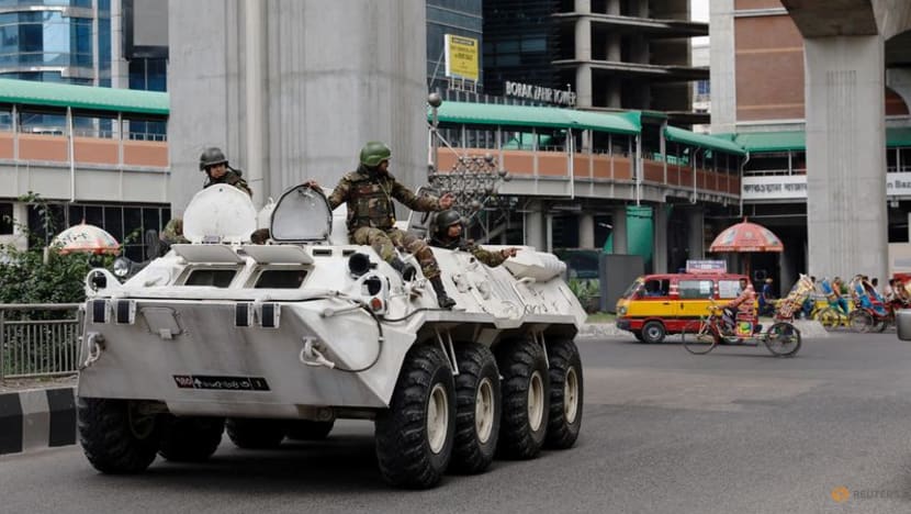 Bangladesh says it forgot to remove UN logos from vehicles as it contained unrest Bangladesh says it forgot to remove UN logos from vehicles as it contained unrest
